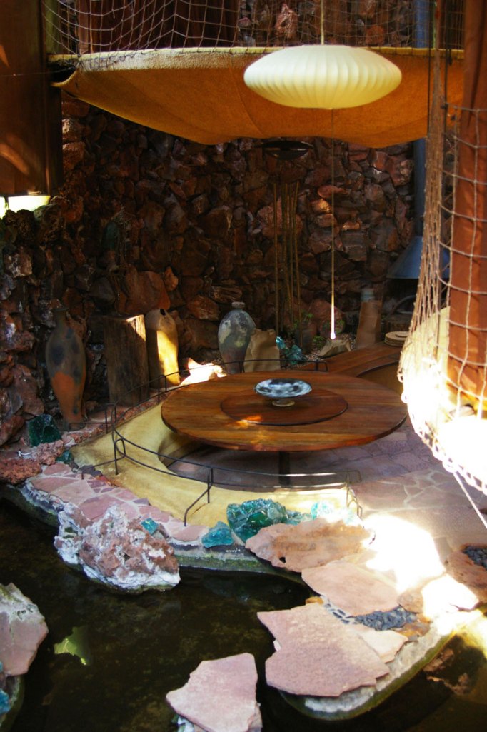 Dining room with koi pond in foreground