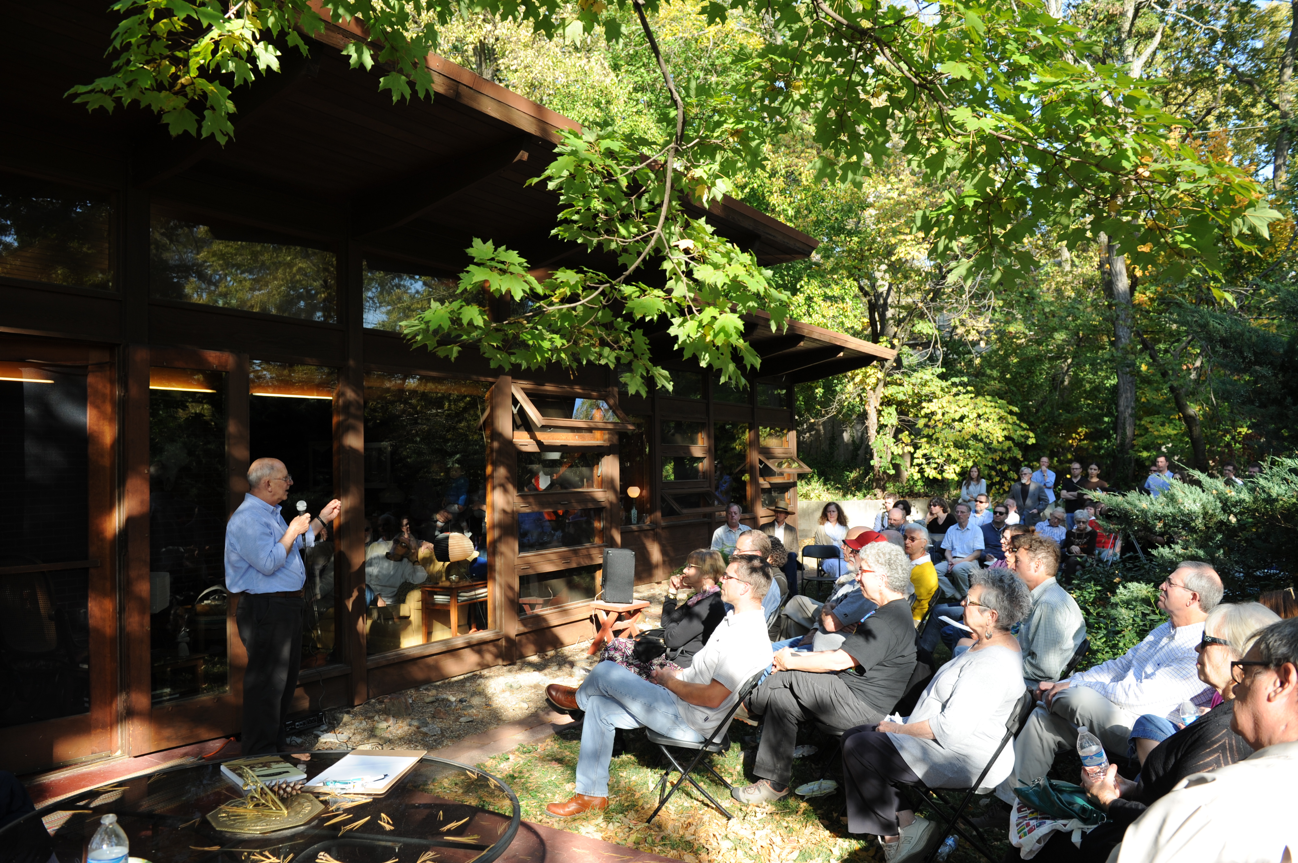 Prof. Emeritus Steve Grabow talks to the crowd at the Lawrence Modern Beal House event, Oct. 2015.